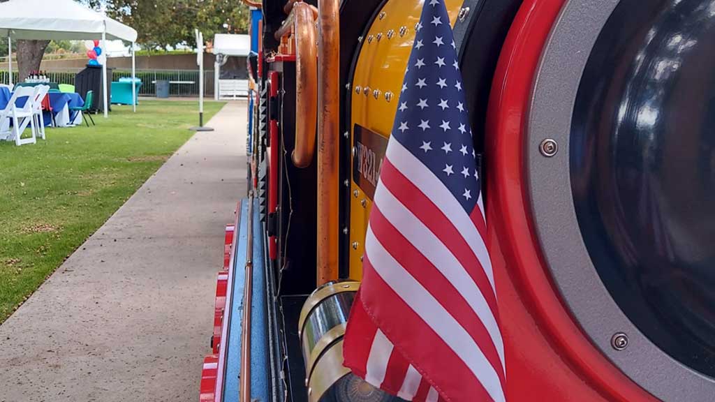 Mini Express trackless train transporting guests at a family resort, enhancing leisure experiences and guest satisfaction