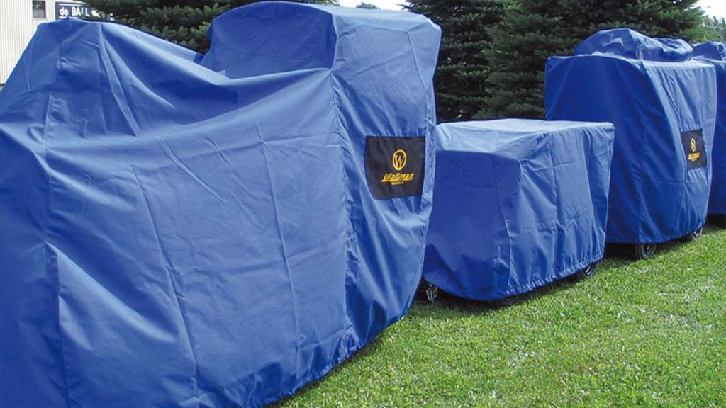 Mini Express trackless train protected with custom-fitted dust and weather-resistant storage covers
