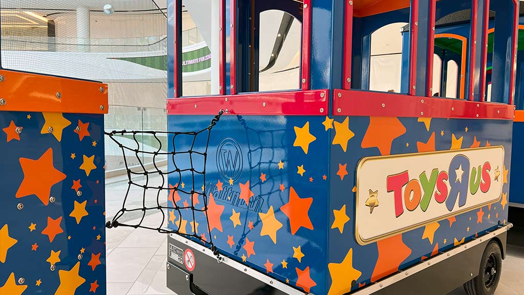 Customized Mini Express trackless train in branded colours and logo design for premium visual identity